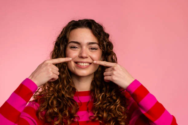 Smiling woman with curly hair